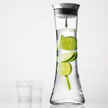Carafe with automatic stopper This Scandinavian design serves water with style. With stainless steel lid & strainer insert.