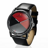 "Noon" Watch Ingenious Turning-Disc-System turns time into rotating images. With 2 interchangeable straps.