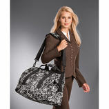  The supplied strap can be hooked onto the Allrounder so you can shoulder it comfortably.