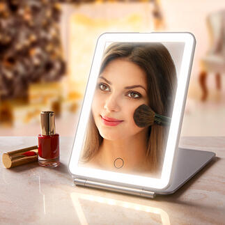 Folding Cosmetic Mirror Extra-large mirror surface. Optimum illumination. Elegant, flat design. For perfect make-up at home and when travelling.