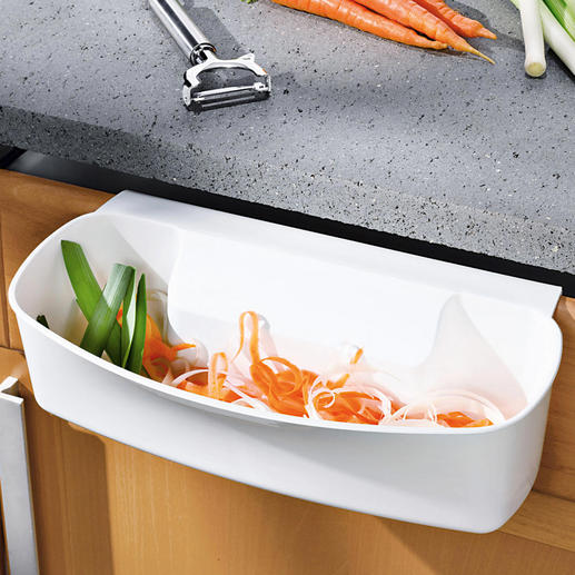 Hanging Waste Basket Saves space on cutting boards and counter tops and keeps your kitchen clean.