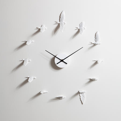 Swallow Clock Enchanting swallows tell the time. Image of lifelike flight movements.