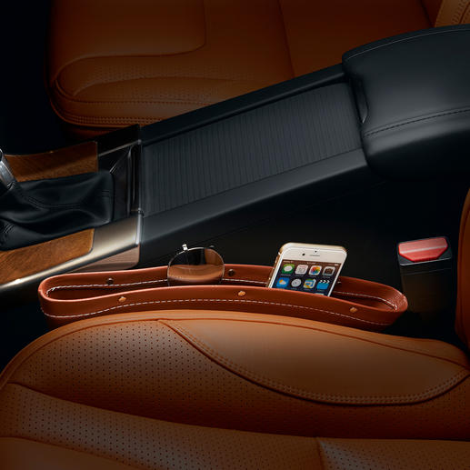 Simply lodge between the seat and console and you’re done. Simply lodge between the seat and console and you’re done.