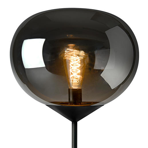 Turn on the light and – as if by magic – the glass globe becomes transparent and shows the glowing light bulb. Turn on the light and – as if by magic – the glass globe becomes transparent and shows the glowing light bulb.