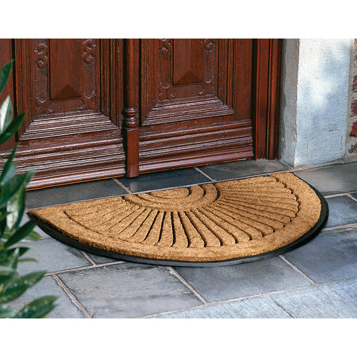Fan design door mat The dense, authentic coir relief pattern on a non-slip heavy rubber base cleans soles perfectly.