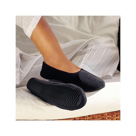 Travel Slippers As comfortable as walking barefoot.