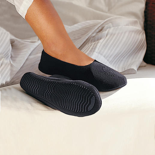 Travel Slippers As comfortable as walking barefoot.